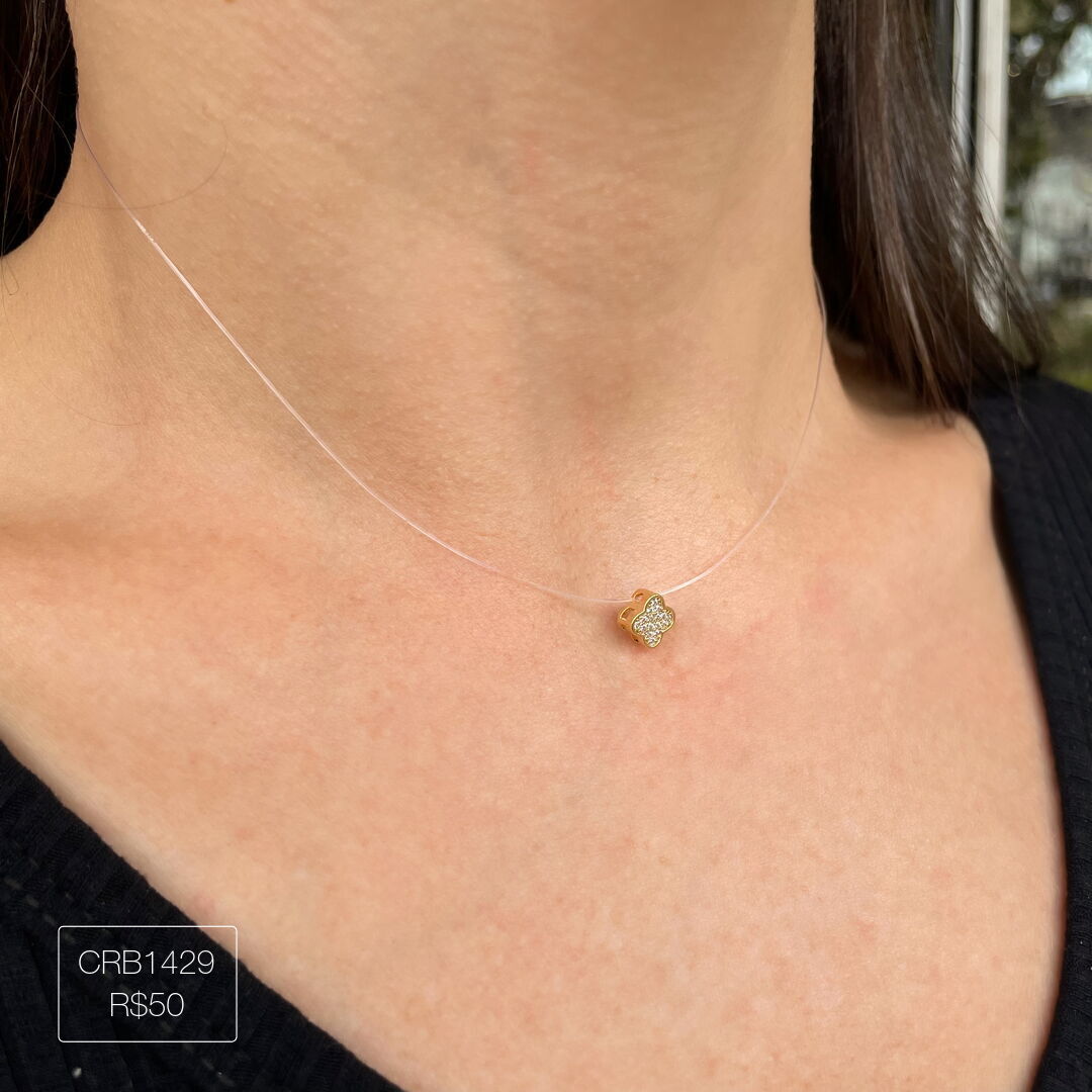 Colar de Nylon c/ Trevo Cravejado Cristal Dourado